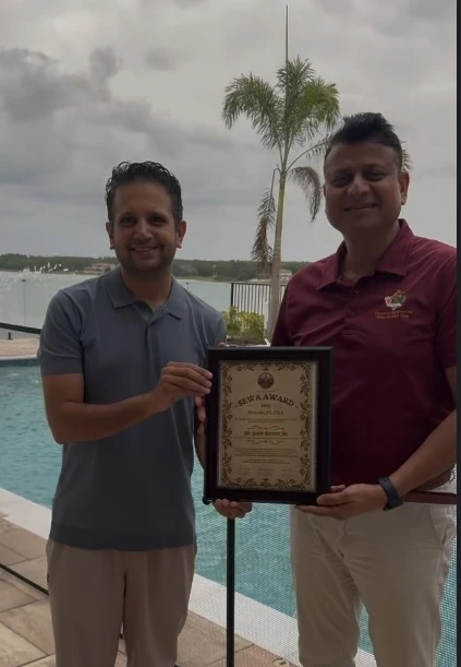 Dr. Jaivir Singh Rathore Sa receiving GARC Sewa Award